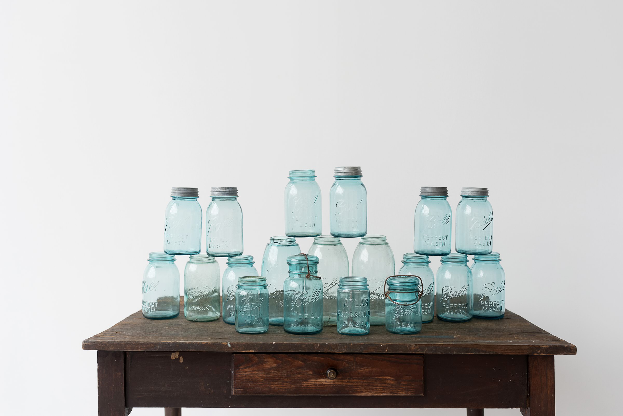 Blue Mason Jar Collection Lost and Found Event Rentals